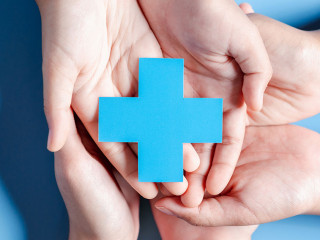 Health insurance concept. Doctor in a white coat uniform hand holding plus and healthcare medical icon, health and access to welfare health concept.