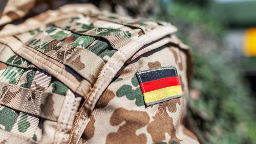 german flag on a german soldier desert uniform
