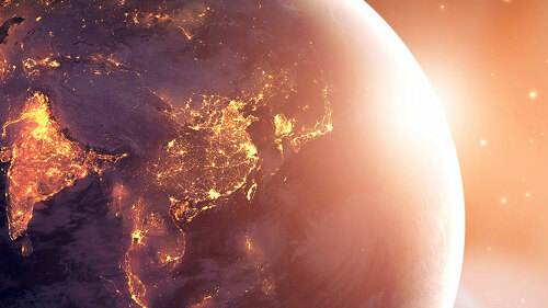 Earth at night was holding in human hands. Earth day. Energy sav