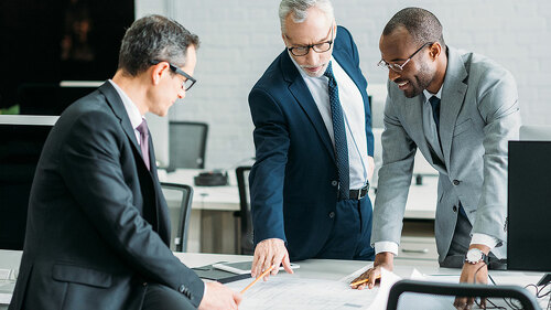 multiethnic businessmen discussing new business strategy on meet