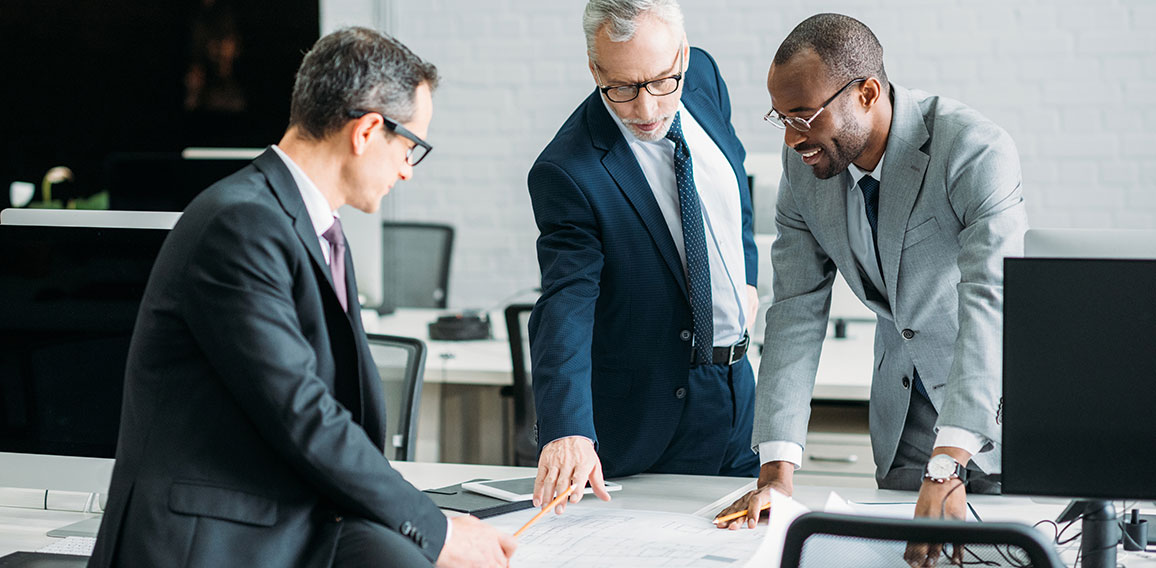 multiethnic businessmen discussing new business strategy on meet