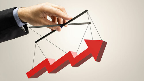 businessman holding red arrow sign. hand supporting the growth c