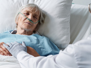 Doctor caring about the senior patient