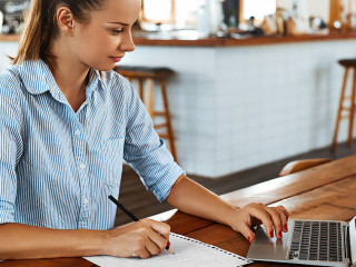 Learning, Studying. Woman Using Laptop Computer At Cafe, Working
