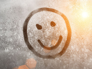 Emoji smile, Autumn rain, inscription on sweaty glass smiley with copy space for text