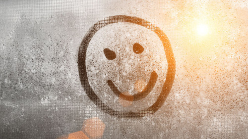 Emoji smile, Autumn rain, inscription on sweaty glass smiley with copy space for text