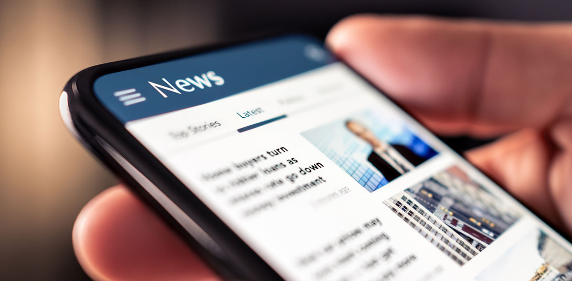 News online in phone. Reading newspaper from website. Digital pu