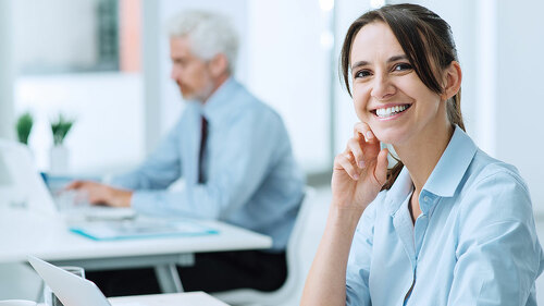 Smiling business woman at work