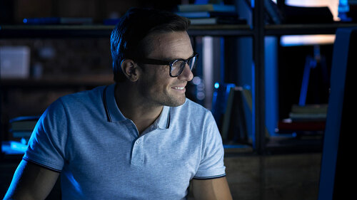 Progressive hardworking man completing the reports