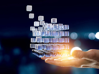 Hand holding glowing cubes. Innovation and creativity concept.