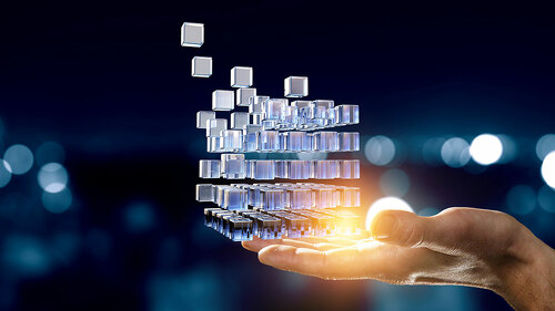 Hand holding glowing cubes. Innovation and creativity concept.