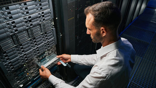 Professional it specialist working in data center