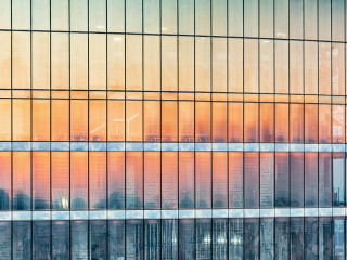 Exterior of the new office building at sunset time.