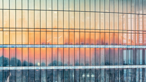 Exterior of the new office building at sunset time.