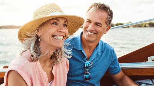 Nothing says summer like a relaxing boat ride. a mature couple enjoying a relaxing boat ride.