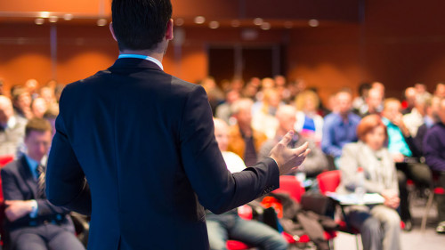 Speaker at Business Conference and Presentation.