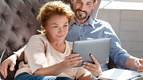 Woman taking selfie with her husband