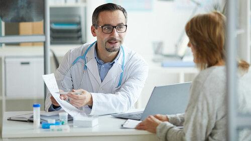 Doctor consulting his patient