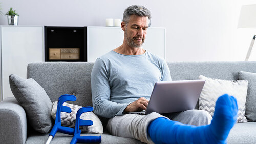 Injured Man With Broken Leg