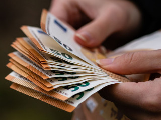 Woman counting money, counting EURO close up