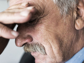 Senior depressed businessman thinking about worries