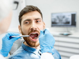 Man during the dental examintaion