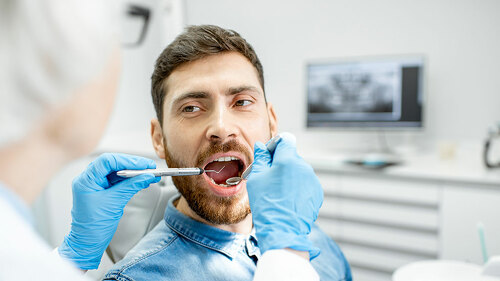 Man during the dental examintaion