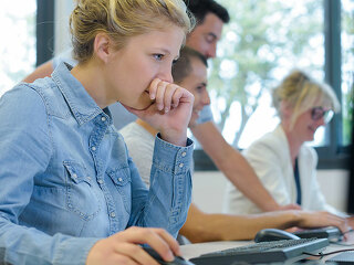 a woman with a computer science studies