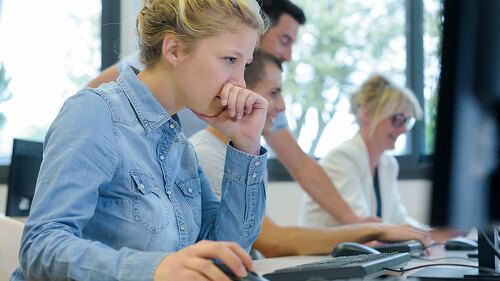 a woman with a computer science studies