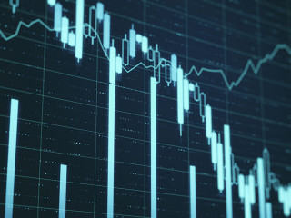 Falling stock exchange statistics on screen.