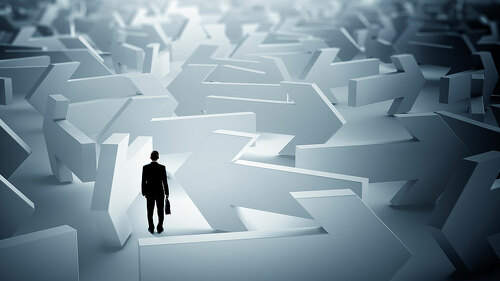 Businessman choosing his business direction