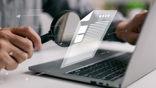 Man inspecting paperwork with magnifier. A business analysis con