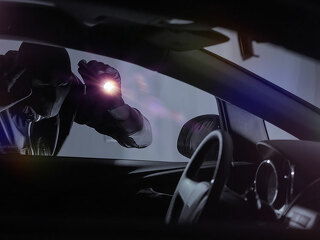 Car Robber with Flashlight