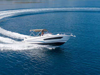 Aerial view of speed motor boat on open sea