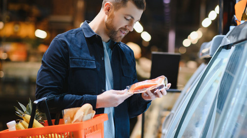 Man shopping in a supermarket