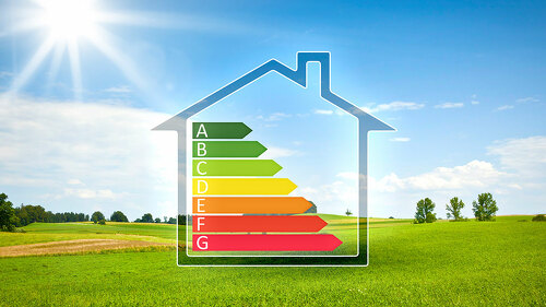 green house in the sun with energy efficiency graph