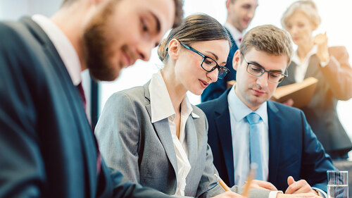 Business people in team meeting collaborating