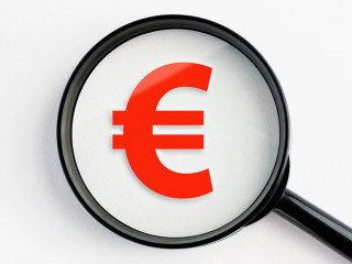 magnifying glass with euro symbol