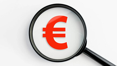 magnifying glass with euro symbol
