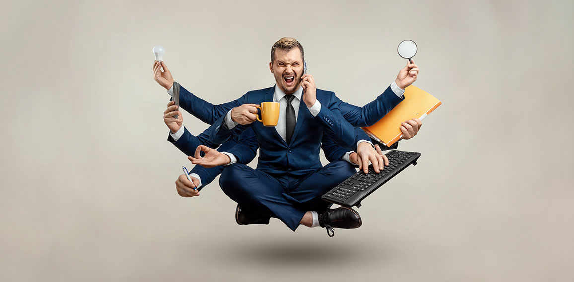 Businessman with many hands in a suit. Works simultaneously with several objects, a mug, a magnifying glass, papers, a contract, a telephone. Multitasking, efficient business worker concept.