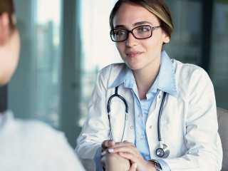 Doctor talking to the patient