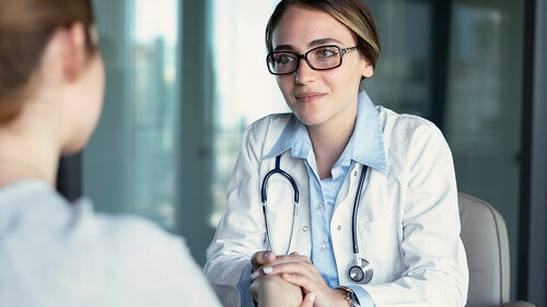 Doctor talking to the patient