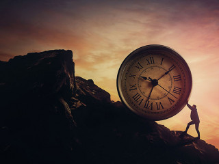 Surreal scene with a businessman pushing a clock up a hill. Time