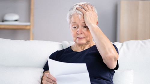Portrait Of A Sad Young Woman Reading