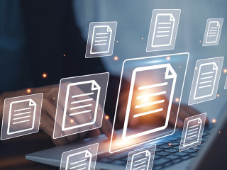 Businessman working on laptop with virtual screen. Online docume