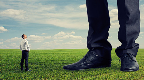 man looking at his big boss