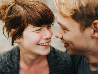 young heterosexual couple in love looking at each other