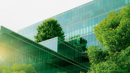 Sustainble green building. Eco-friendly building. Sustainable gl