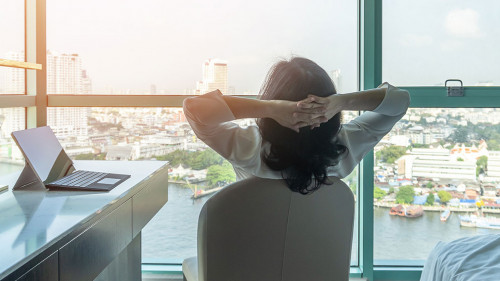 Work-life balance relaxation with Asian working business woman h