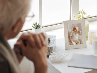 Selective focus of a photo standing on the bedside table